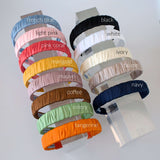Hand wrapped satin 1 inch headband for women and girls.