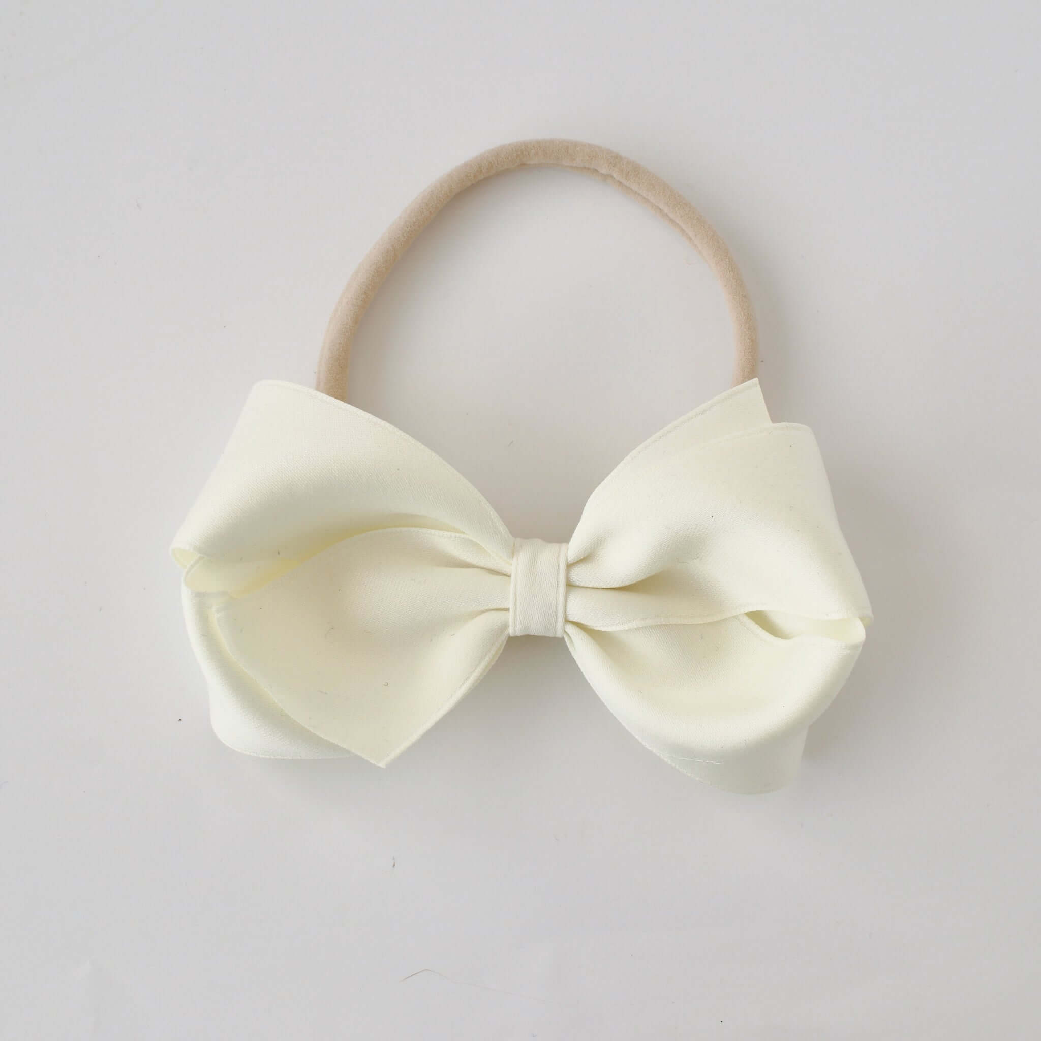 Sustainable recycled polyester 4 inch matte satin bow headband for newborn to girls in ivory