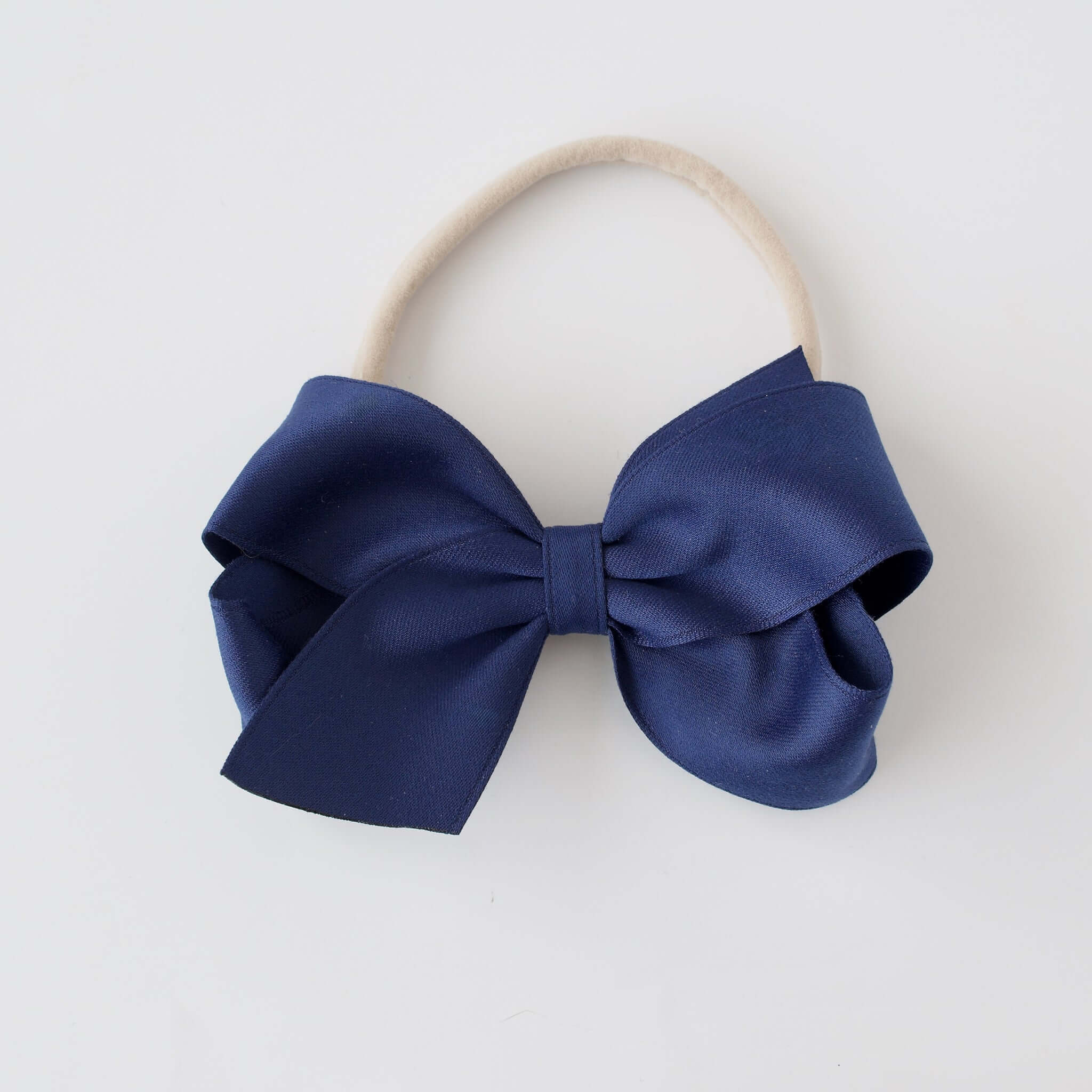 Sustainable recycled polyester 4 inch matte satin bow headband for newborn to girls in navy
