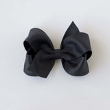 Sustainable recycled polyester 4 inch matte satin hair bow for toddlers to girls in black