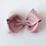 Sustainable recycled polyester 4 inch matte satin hair bow for toddlers to girls in dusty rose
