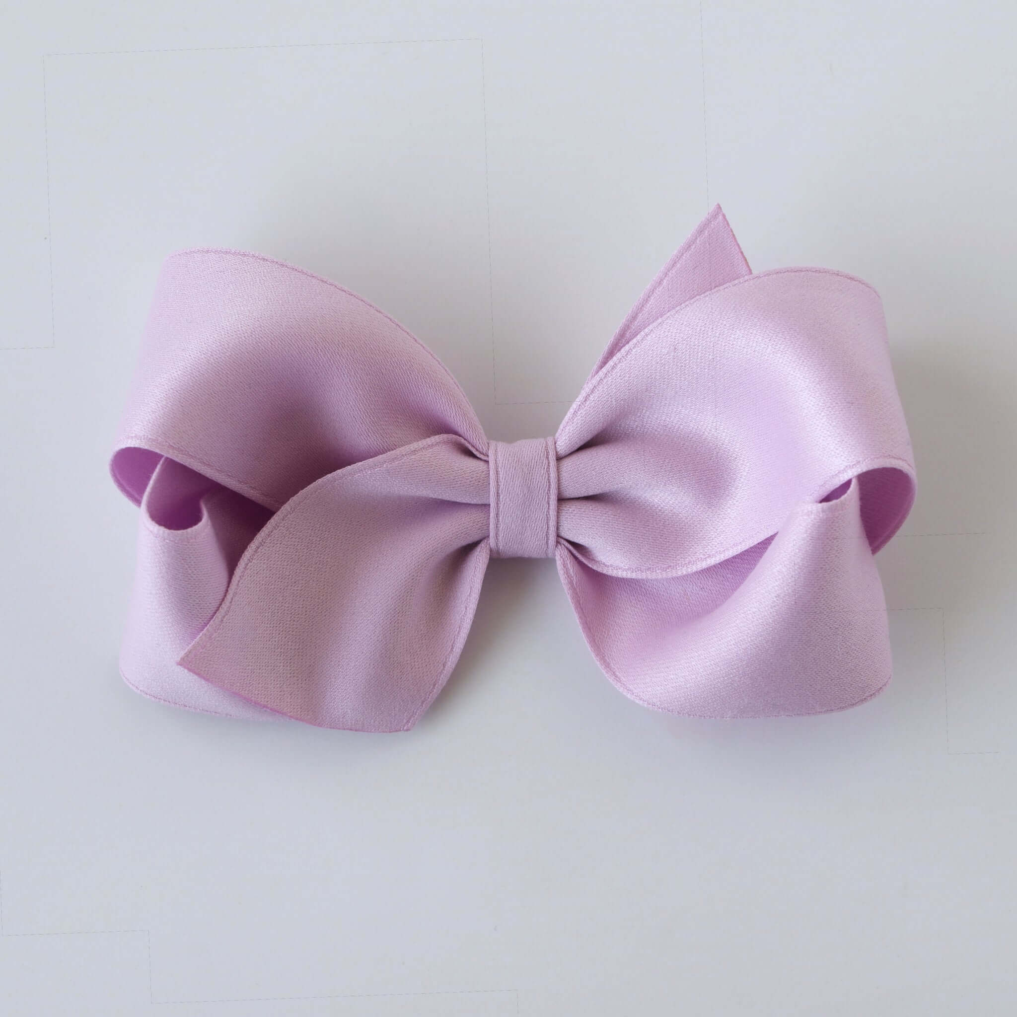 Sustainable recycled polyester 4 inch matte satin hair bow for toddlers to girls in lavender