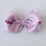 Sustainable recycled polyester 4 inch matte satin hair bow for toddlers to girls in lavender