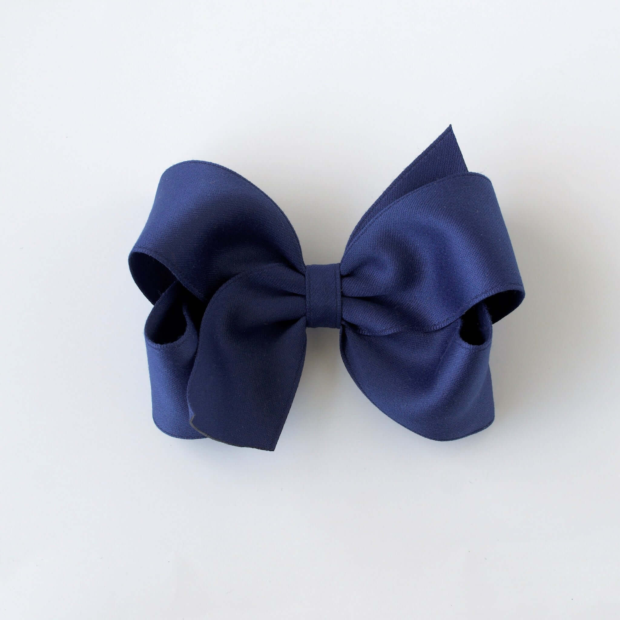 Sustainable recycled polyester 4 inch matte satin hair bow for toddlers to girls in navy