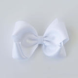 Sustainable recycled polyester 4 inch matte satin hair bow for toddlers to girls in white
