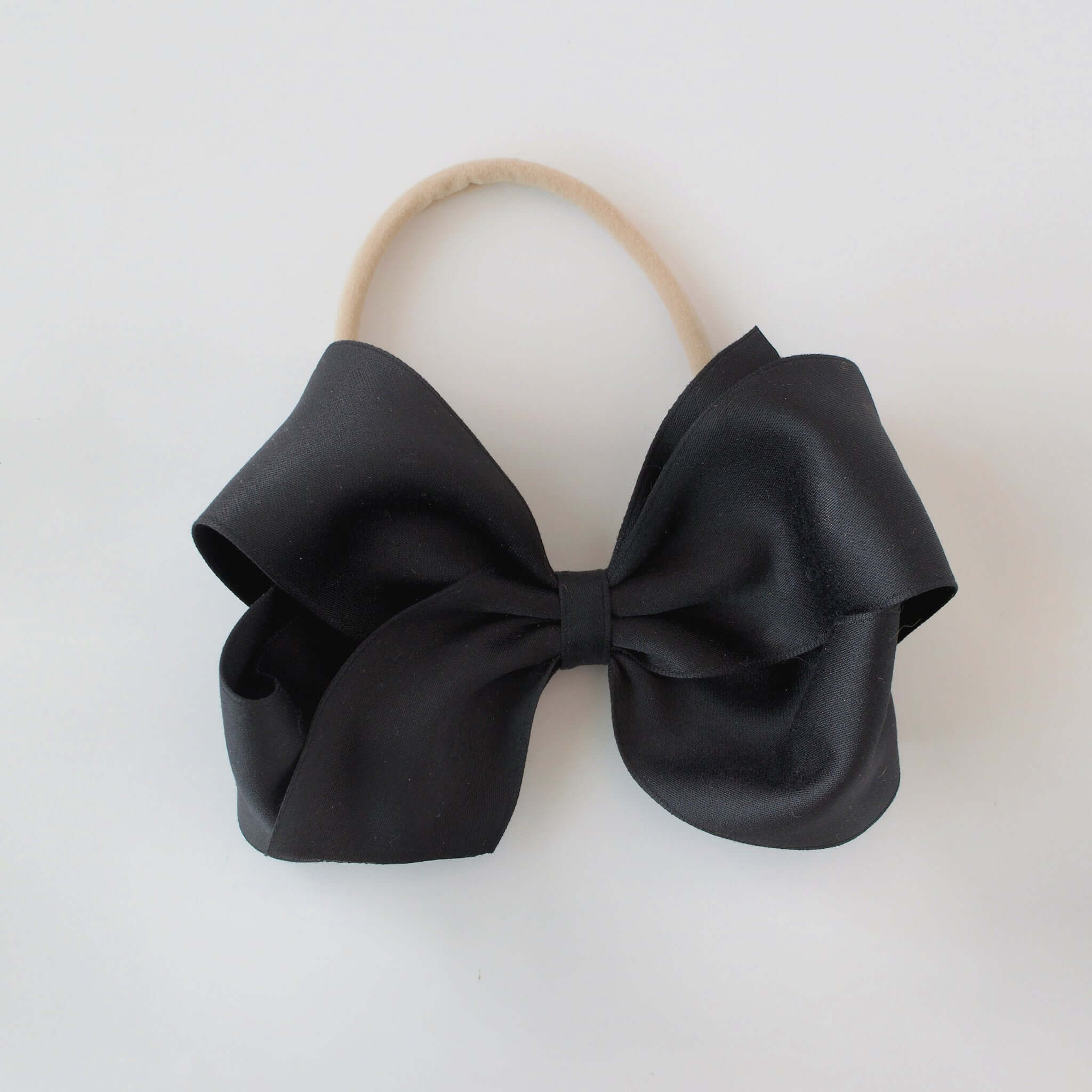 Sustainable recycled polyester matte satin bow headband for newborn to girls in black