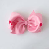 Sustainable recycled polyester 5 inch matte satin hair bow for toddlers to girls in pink