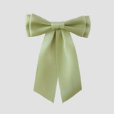 Mia Satin Hair Bow in Celadon, Light green bow on a white background