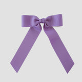 Dark orchich grosgrain Zoe Petite bow on a white background