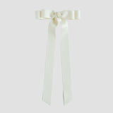 Ivory bow with long tails on a white background