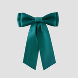 Jade green Mia Satin Hair Bow on a white background