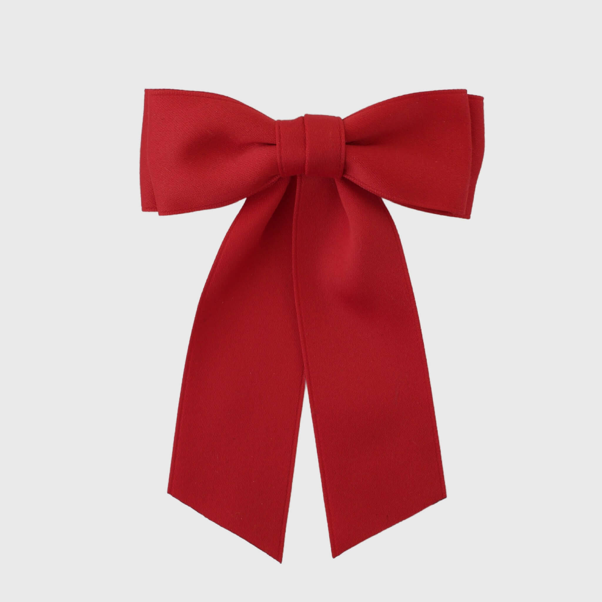 Handmade Mia Matte Satin Bow in red, crafted from eco-friendly recycled satin, perfect for young girls and women.