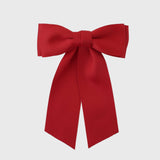 Handmade Mia Matte Satin Bow in red, crafted from eco-friendly recycled satin, perfect for young girls and women.