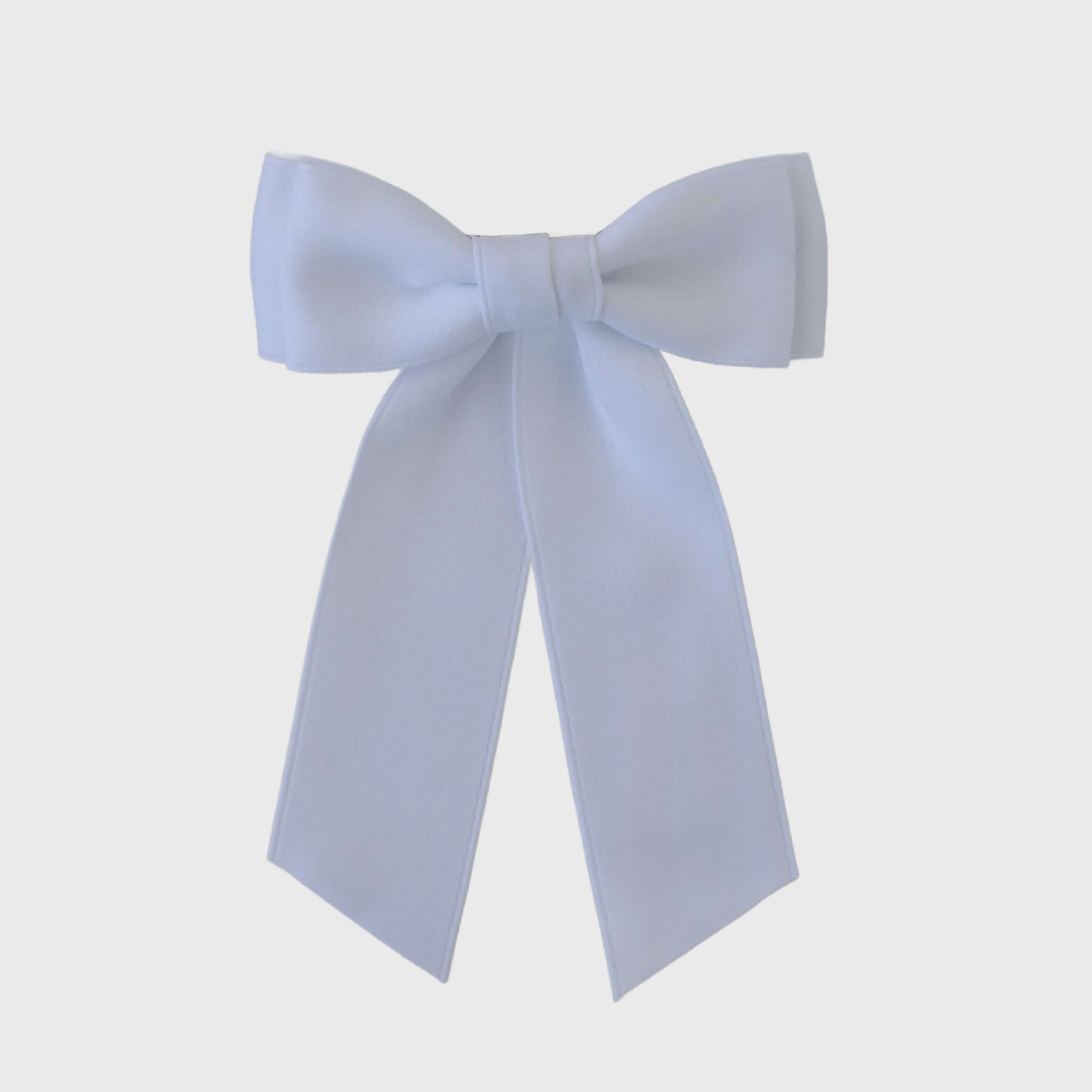 Mia Matte Satin Bow in white, handcrafted with sustainable recycled satin ribbon, perfect for young girls and women.