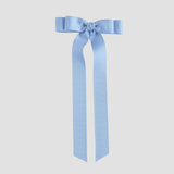Blue grosgrain ribbon bow on a white background
