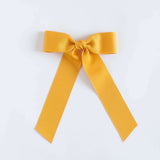 Mustard yellow grosgrain Zoe petite bow.