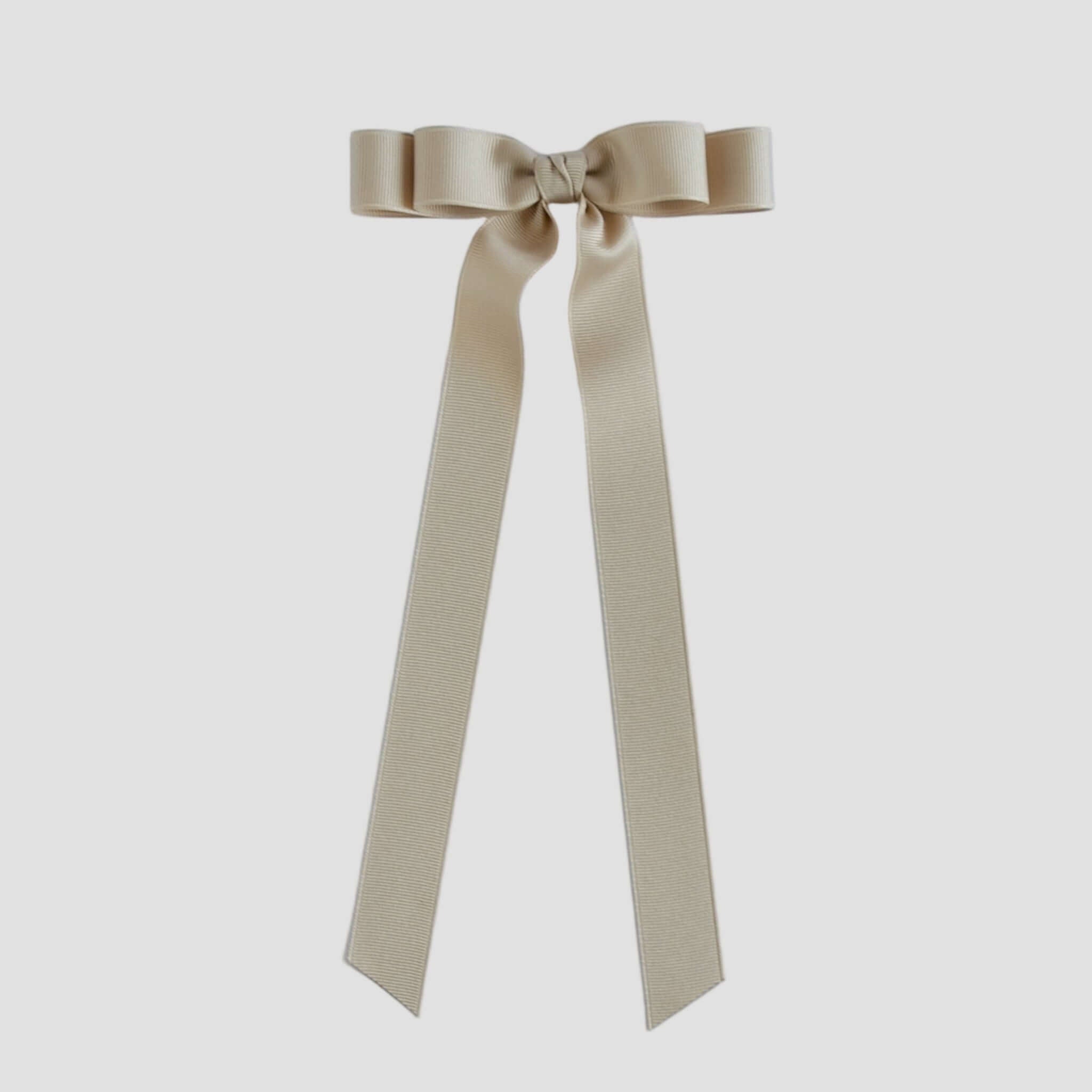Oatmeal beige Bailee ribbon bow on a white background