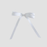 White ribbon bow on a white background