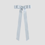 Silver grosgrain ribbon bow on a white background