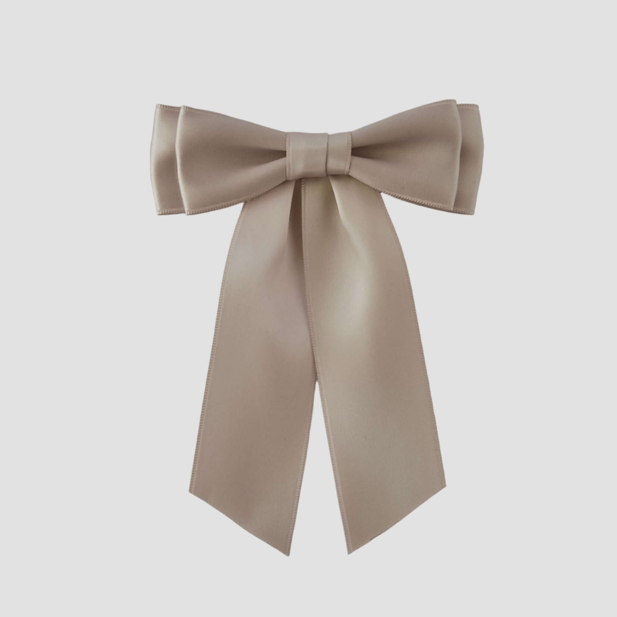 Mia Satin Hair Bow in Taupe on a white background