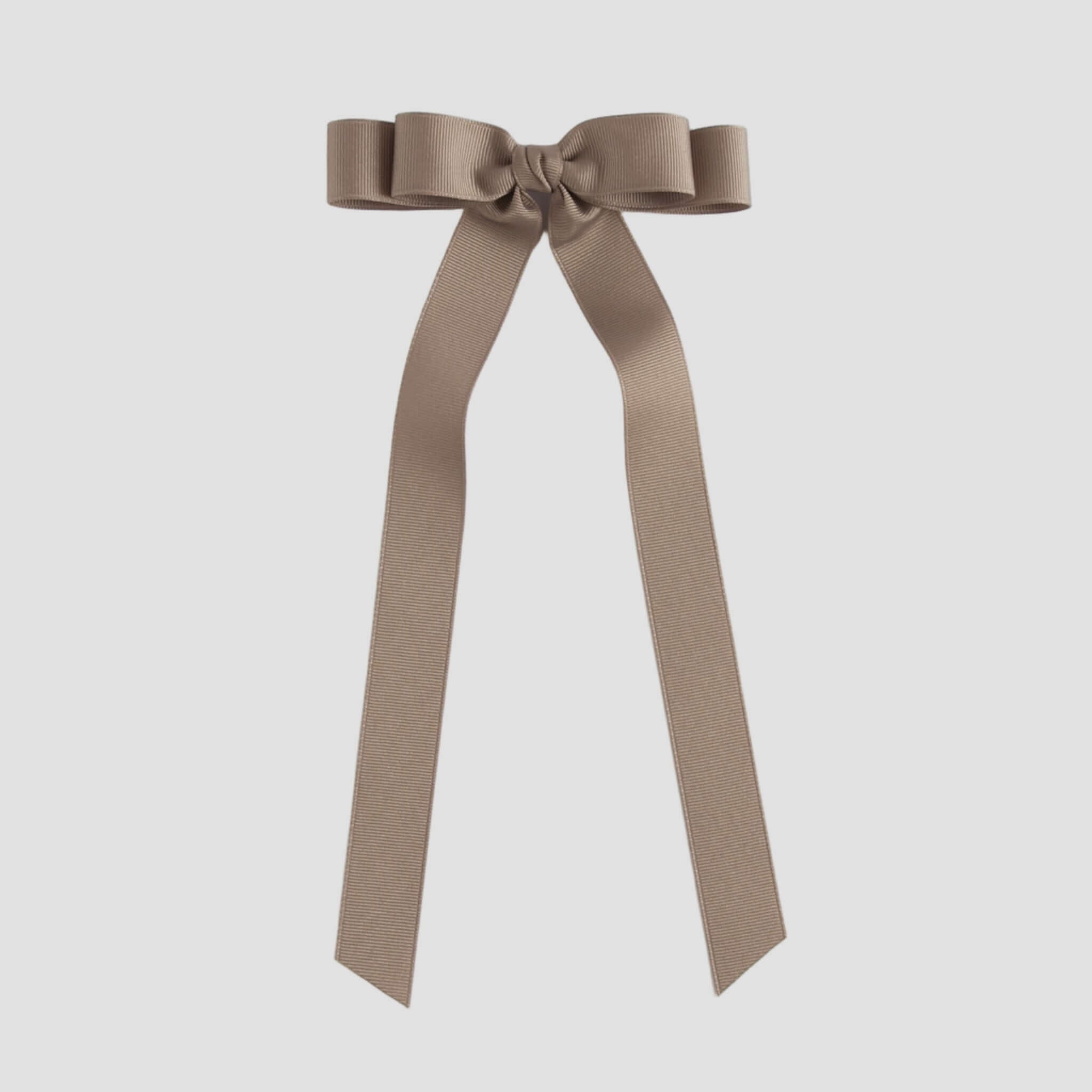 Taupe brown ribbon bow on a white background