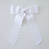 White grosgrain Zoe Petite bow on a white background