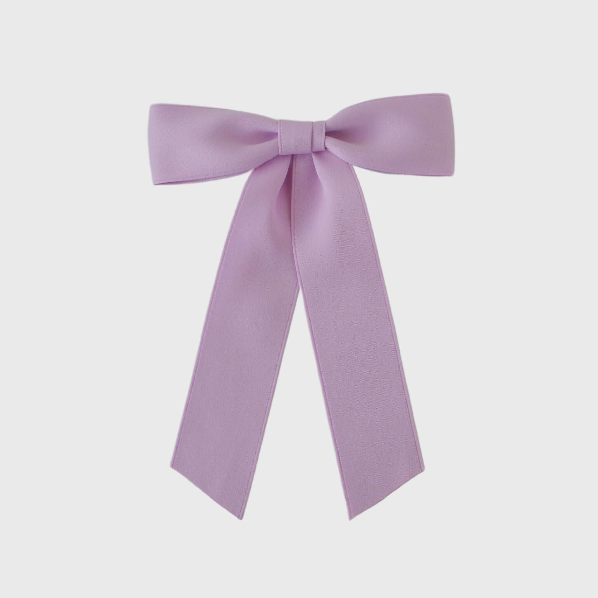 Sustainable recycled matte satin ribbon hair bow in soft lavender for women and girls, perfect for elegant styling.
