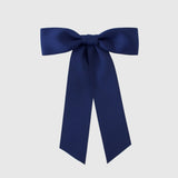 Zoe Petite Matte Satin Bow in navy, a sustainable recycled ribbon hair bow for women and girls.