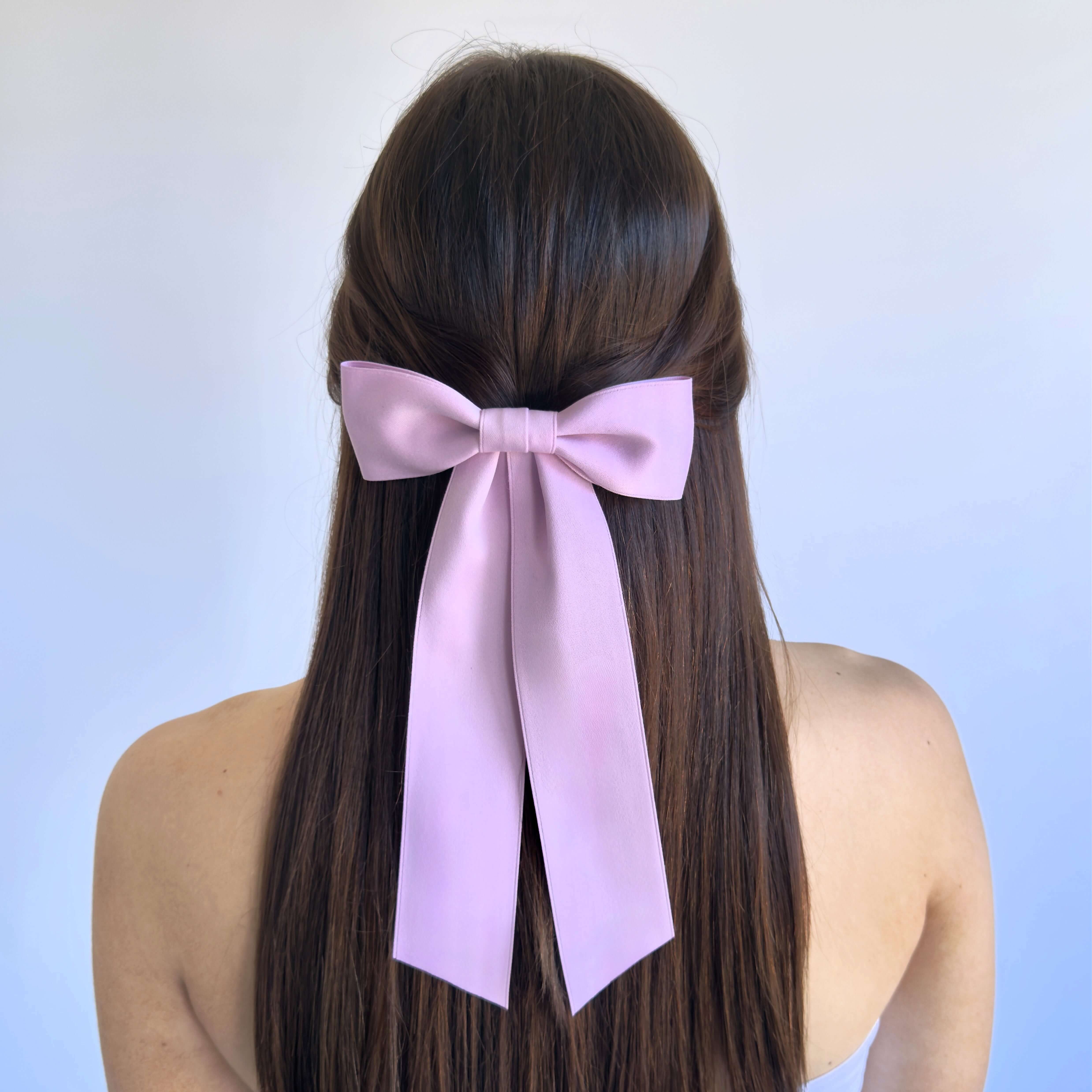 Zoe Matte Satin Bow in pink, oversized long tail handmade bow made from sustainable recycled matte satin ribbon.