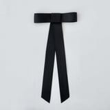 Zoe Mini Matte Satin Bow in black, handmade with eco-friendly recycled material for versatile hair styling.
