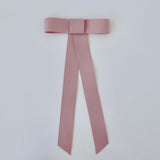 Zoe Mini Matte Satin Bow in soft pink, handmade with eco-friendly recycled ribbon for stylish versatility.