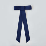 Zoe Mini Matte Satin Bow in navy, made from sustainable recycled material, perfect for stylish hair accessories.