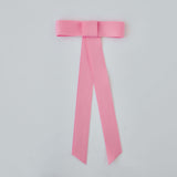 Zoe Mini Matte Satin Bow in pink, made of sustainable recycled ribbon, perfect for hair styling and special occasions.