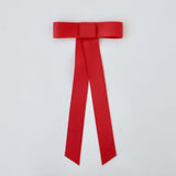 Zoe Mini Matte Satin Bow in red, handmade with sustainable recycled material for versatile styling.