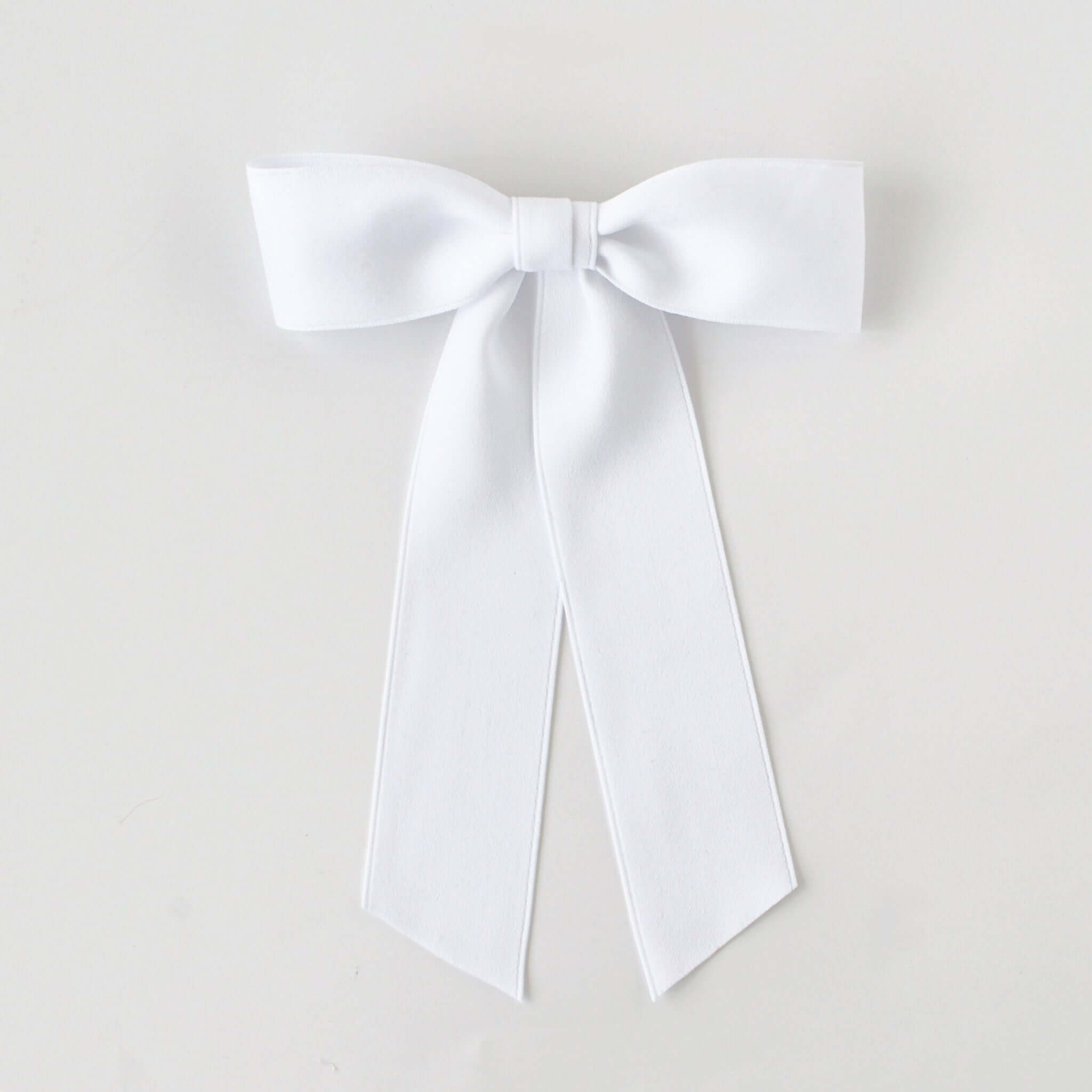 Sustainable recycled matte satin ribbon hair bow in white for women and girls, perfect for versatile styling.