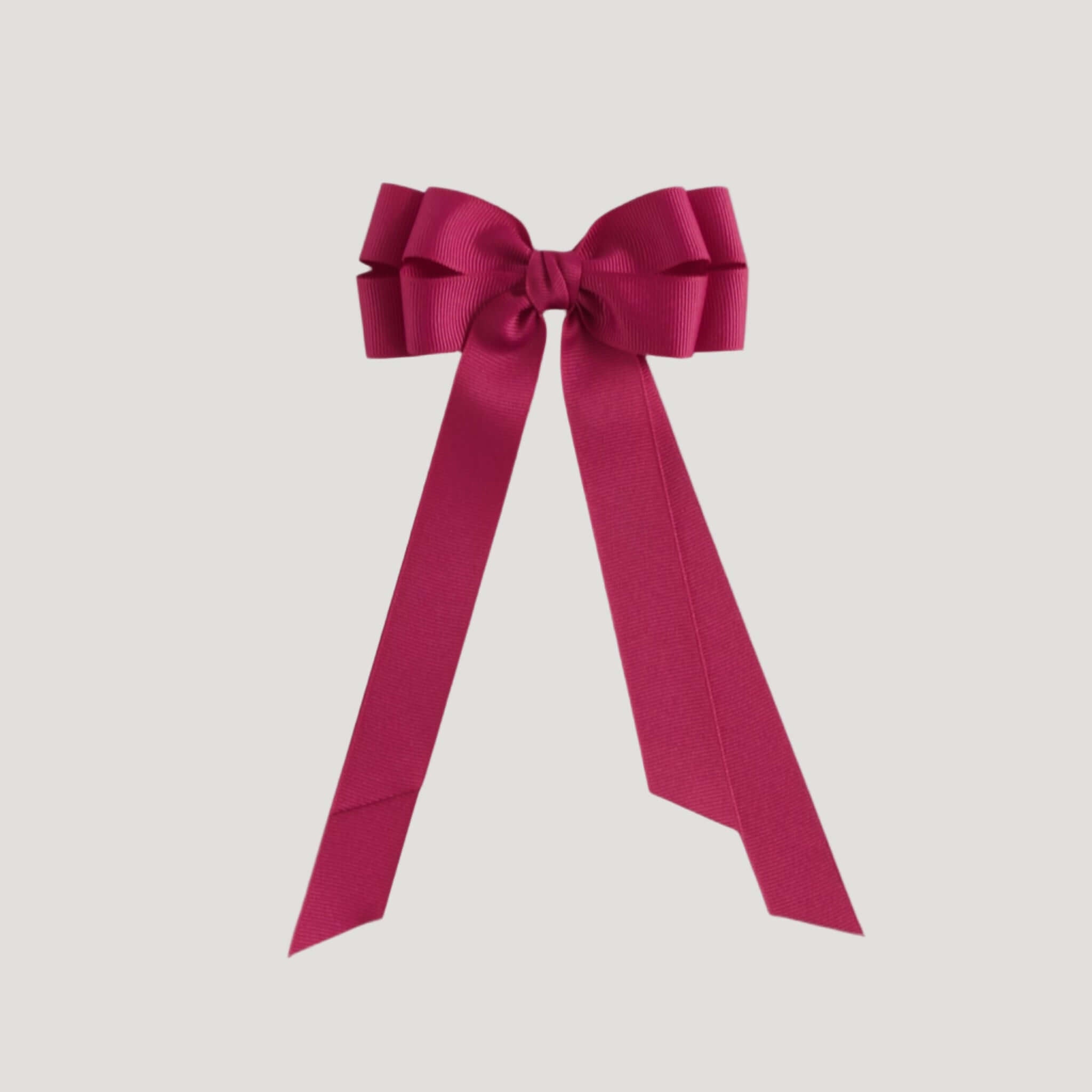 Azalea pink bow on a white background