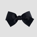 Black bow on a white background