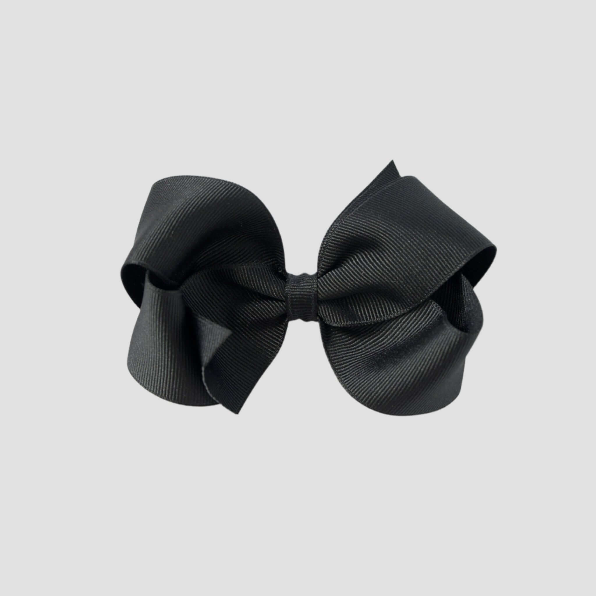 Black hair bow on a white background