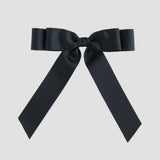 Black bow on a white background
