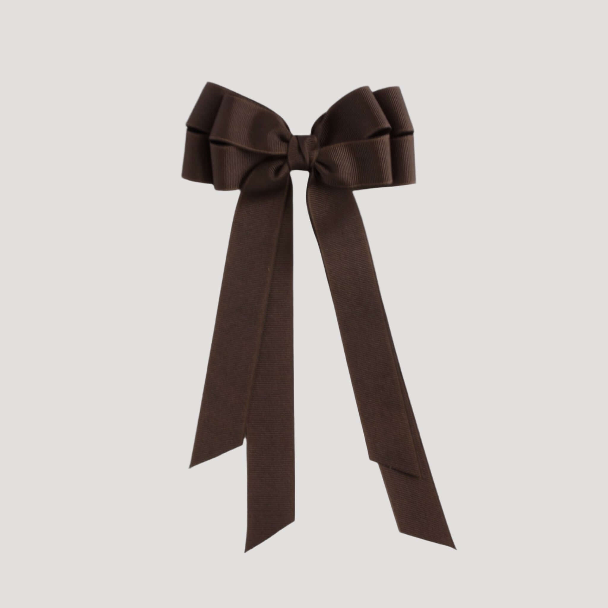 Brown bow on a white  background