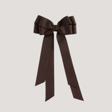 Brown bow on a white  background