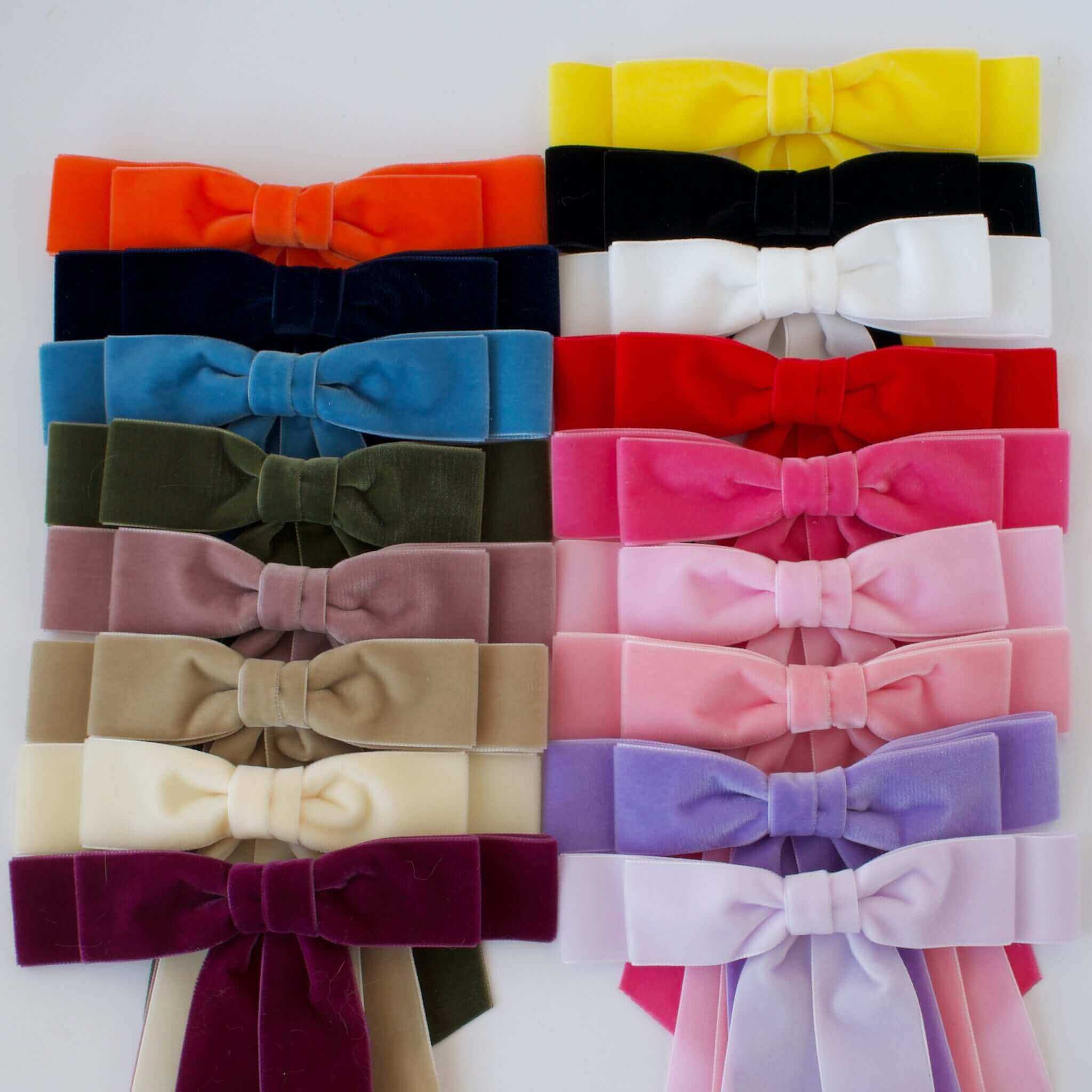 Elegant hair accessory: velvet bows for polished looks.