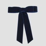 Grace velvet hair bow in navy on a white background.