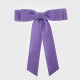Glamorous ponytail bow. Trending colors for 2025.