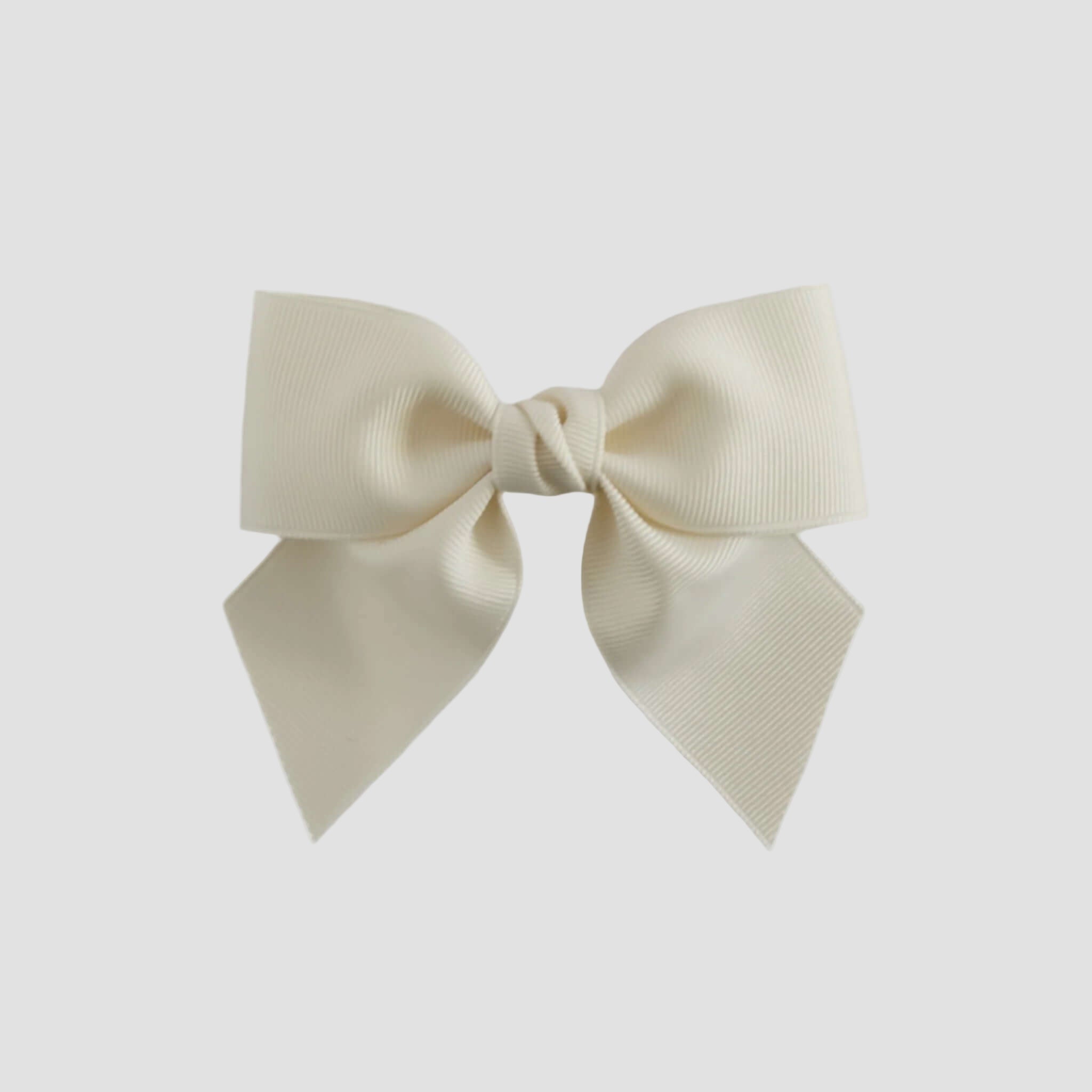 Ivory colored bow on a white background
