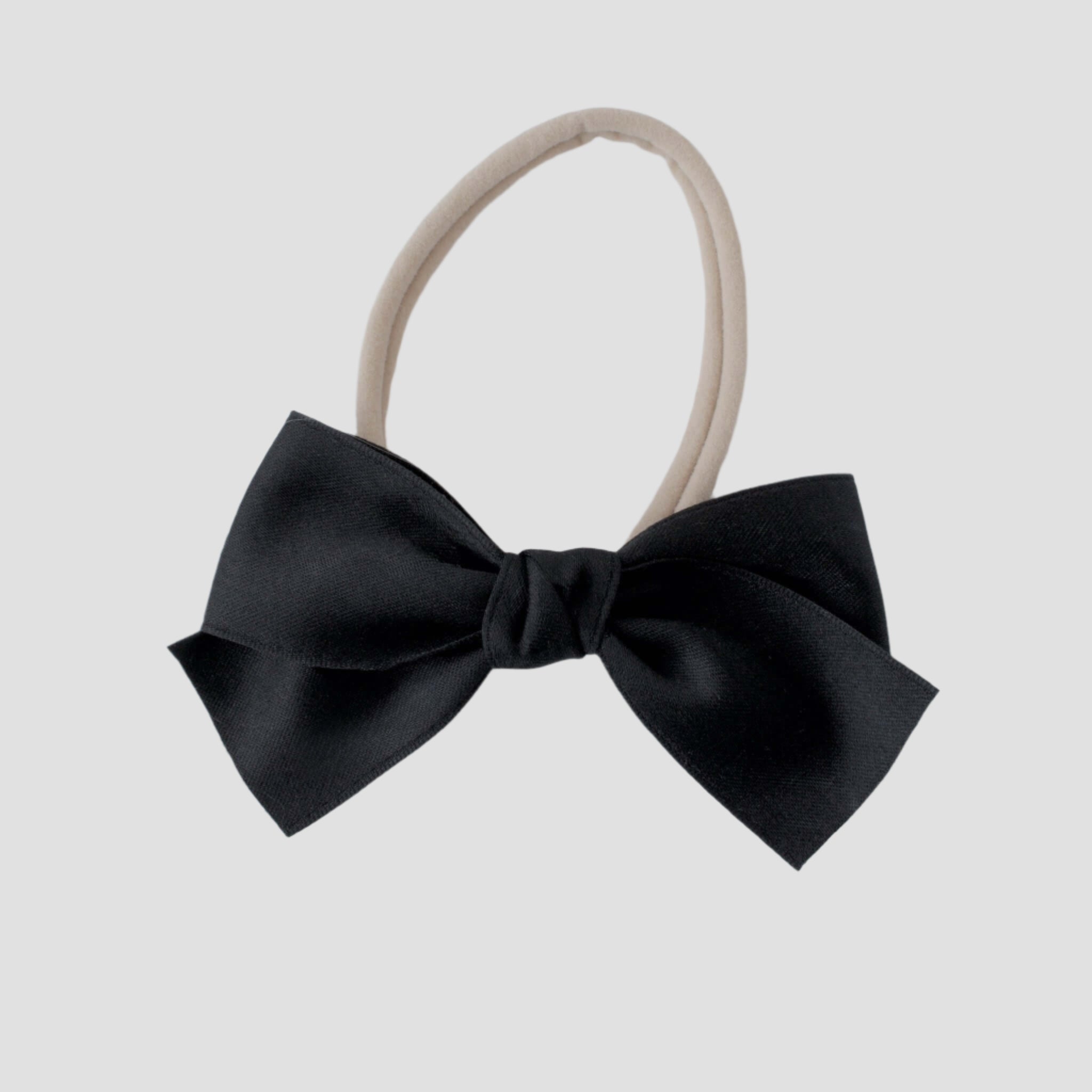 Sustainable recycled polyester matte satin bow headband for newborns to toddlers in black