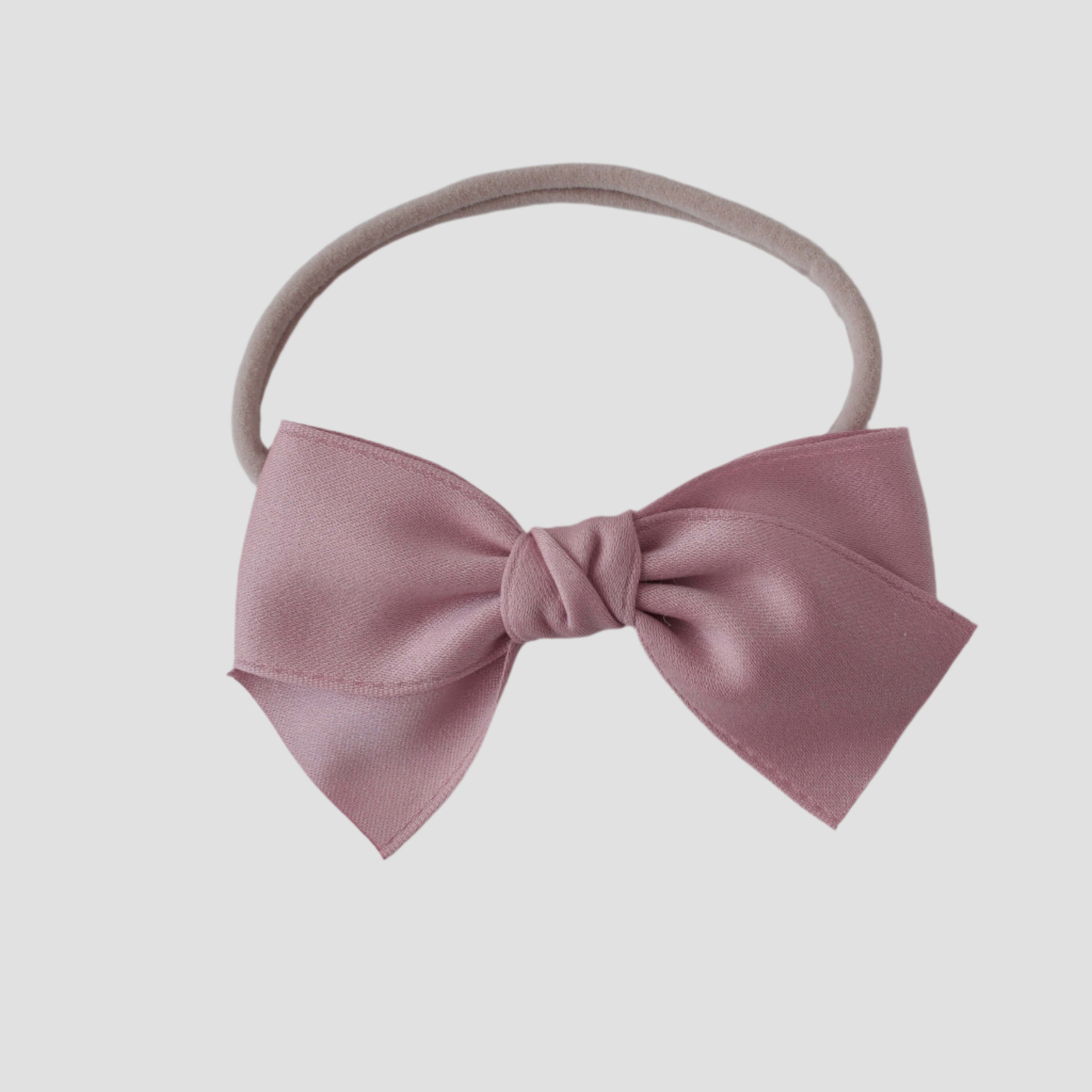 Sustainable recycled polyester matte satin bow headband for newborns to toddlers in dusty rose