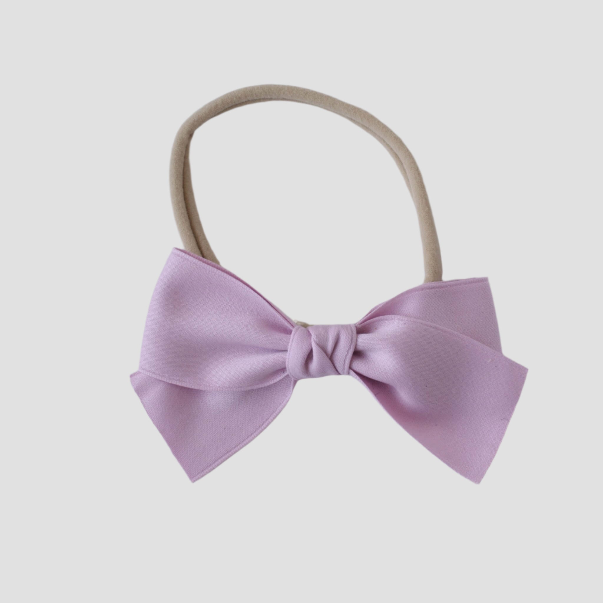 Sustainable recycled polyester matte satin bow headband for newborns to toddlers in lavender