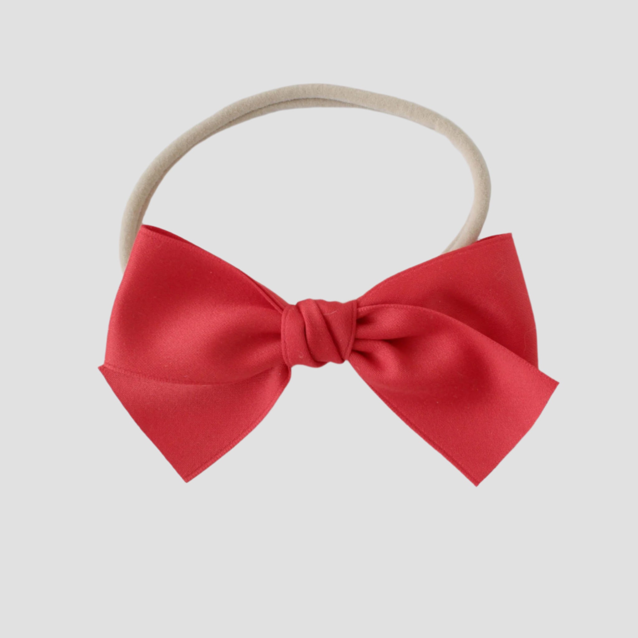 Sustainable recycled polyester matte satin bow headband for newborns to toddlers in red