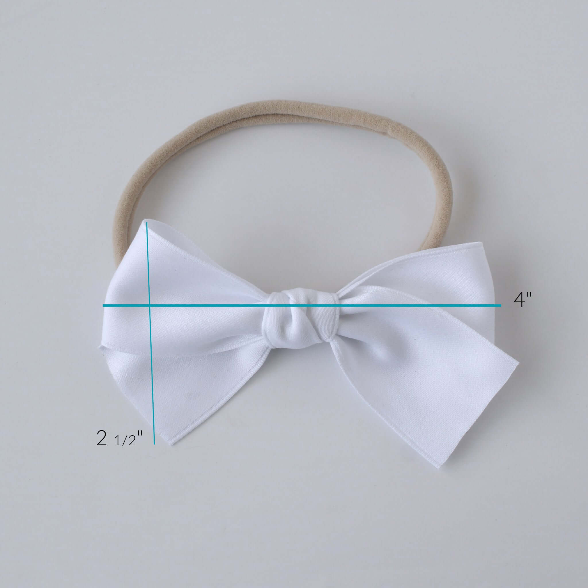 Sustainable recycled polyester matte satin bow headband for newborns to toddlers in white